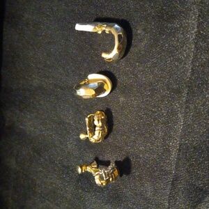 Two pairs clip On earrings.